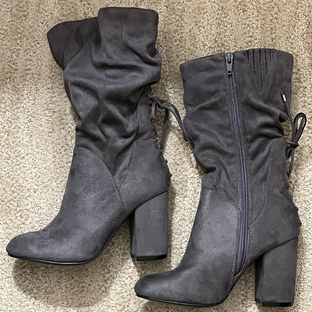 Gray brand new lace up boots. Size 5.5